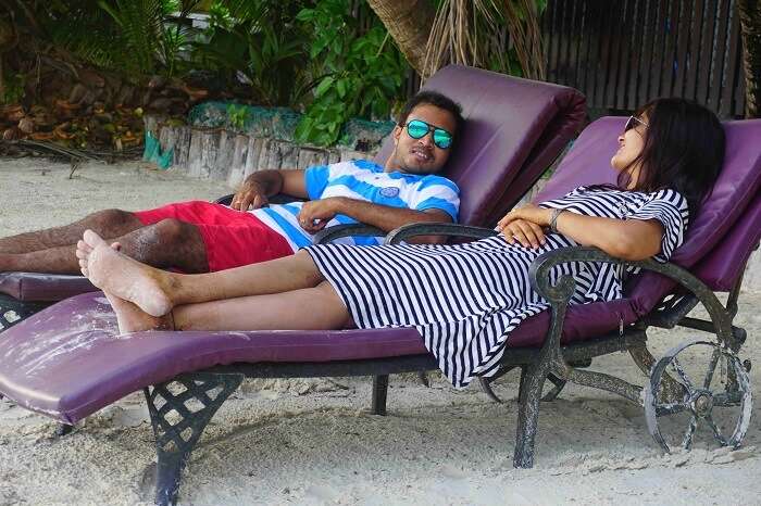 tushar seychelles honeymoon trip: resting on a recliner