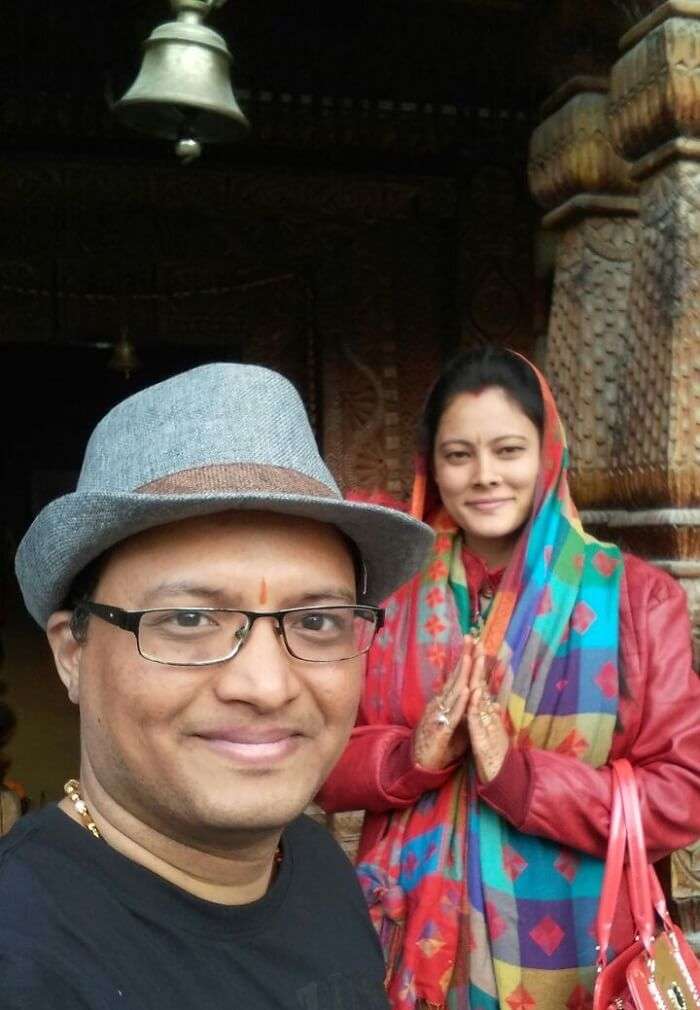 kuldeep manali honeymoon trip: posing near shiv statue manikaran