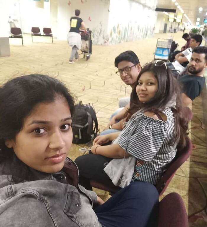 pallavi vietnam family trip: dining at airport groupfie