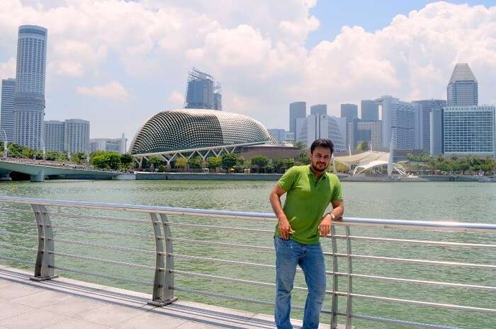 anshu singapore trip: sushant posing near waterfront