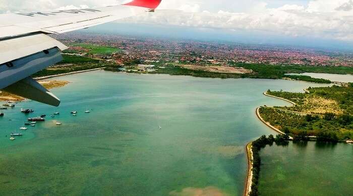couple clicking bali's photo from plane