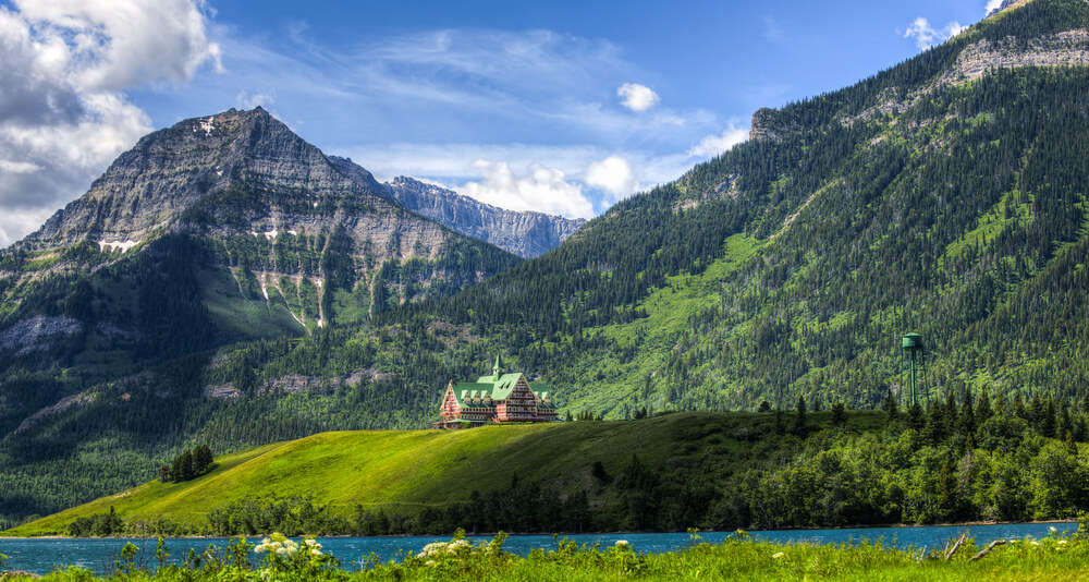 a wooden house amid Waterton Lakes National Park