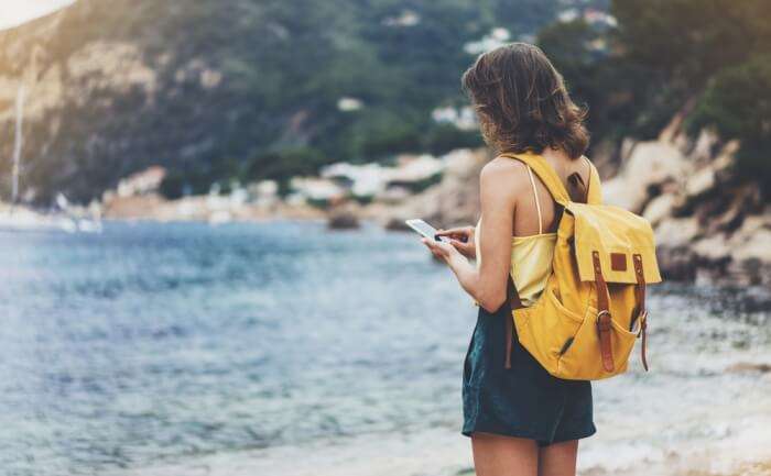 using cellphone at the beach