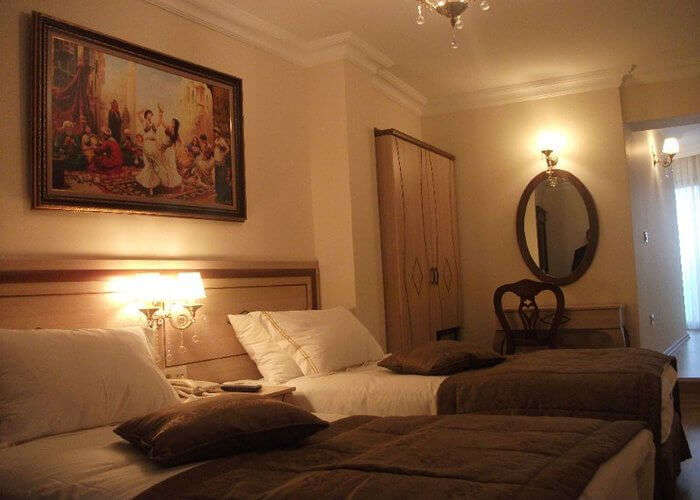 antiquated guestrooms in Sultan Hotel