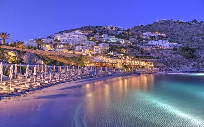 Santa Marina resort from the beach at night