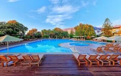 an outdoor pool with wooden sundecks around it 1 ss18062018