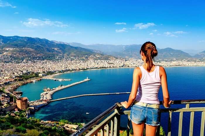 woman looking at the sea in antalya