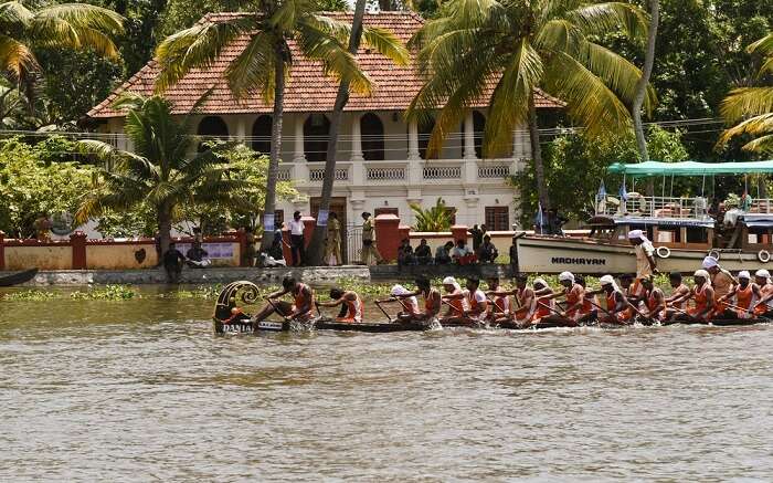 men rowing a boat 