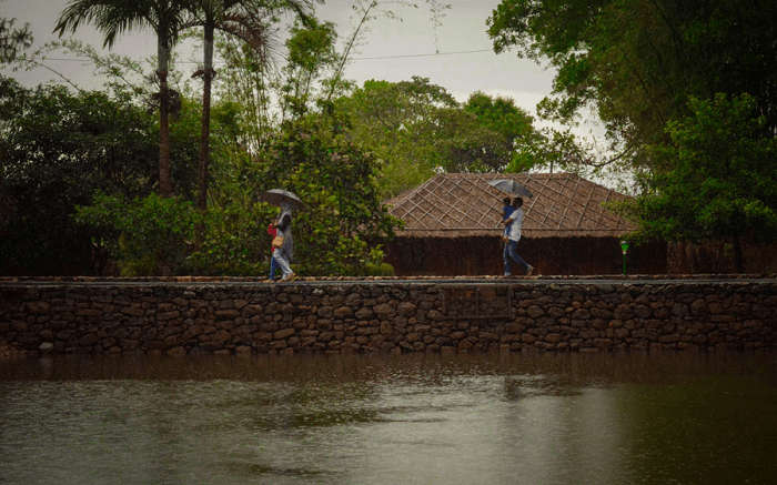 people walking by Saj Vagamon Hideout 