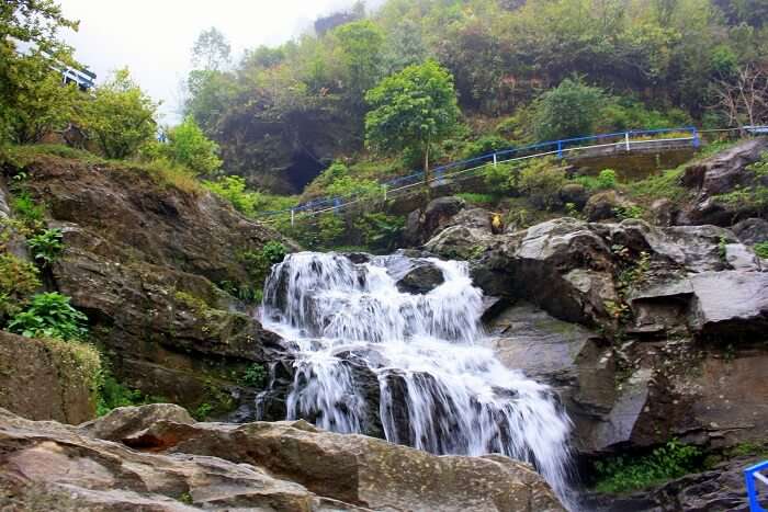 Drive down Hill Cart Road waterfall