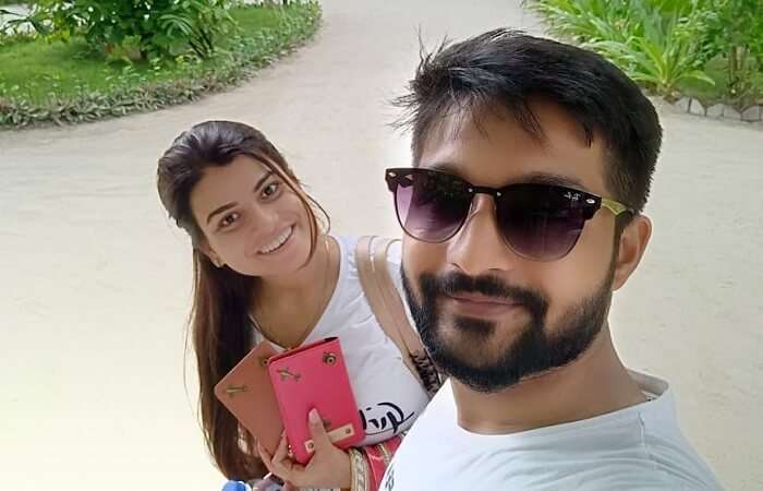 couple with passports in maldives