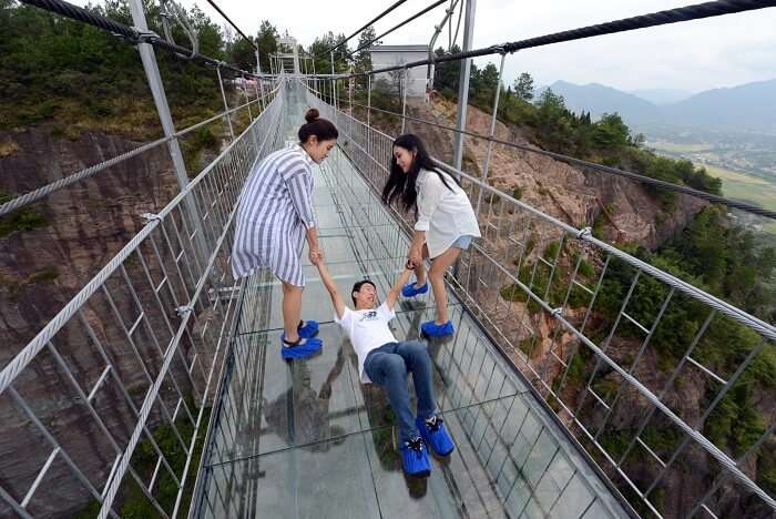 Glass suspension bridge in China opens to public