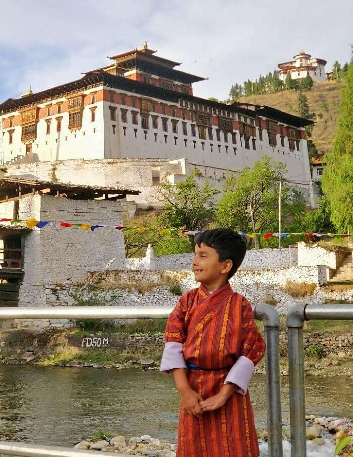 rohit bhutan family trip travelogue son in traditional dress
