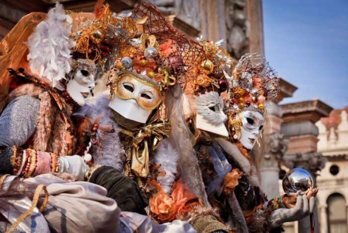 people in Venetian mask during Venice Carnival