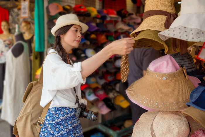 A tourist shopping in the market in Philippines.