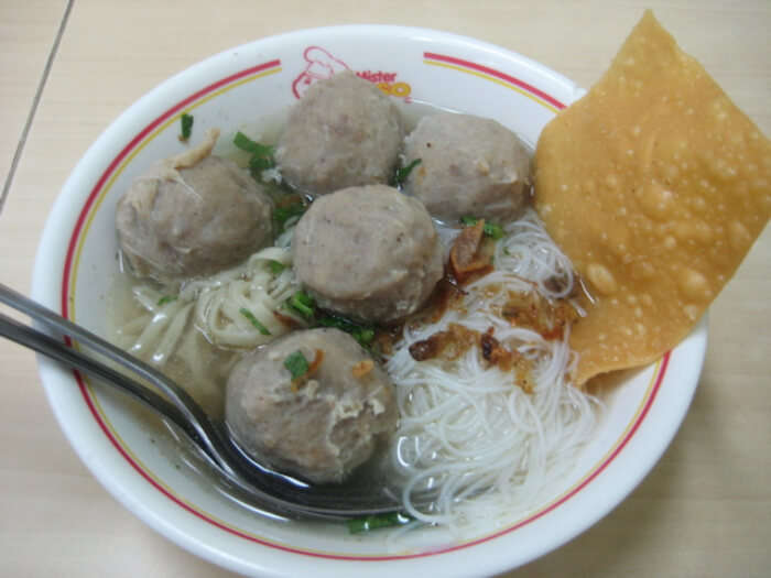 served with yellow noodles and rice vermicelli
