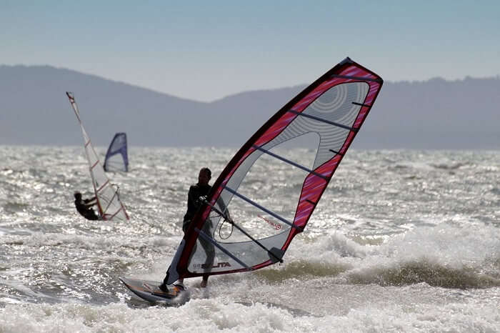 man doing windsurfing