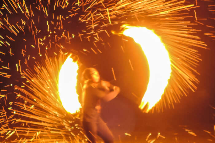 Fire show during the new year party in Thailand on Koh Lanta beach