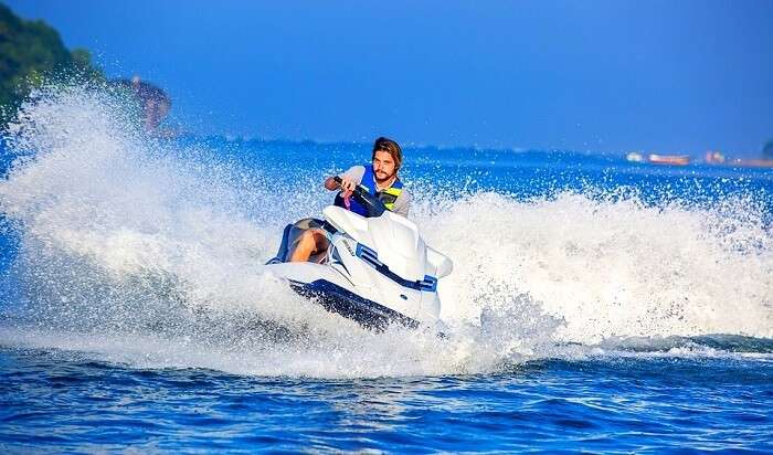 a man in water boat