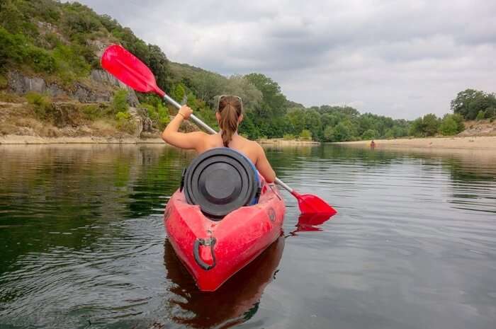 woman canoeing in the river