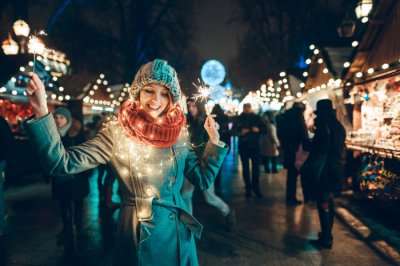 A city decorated with lights