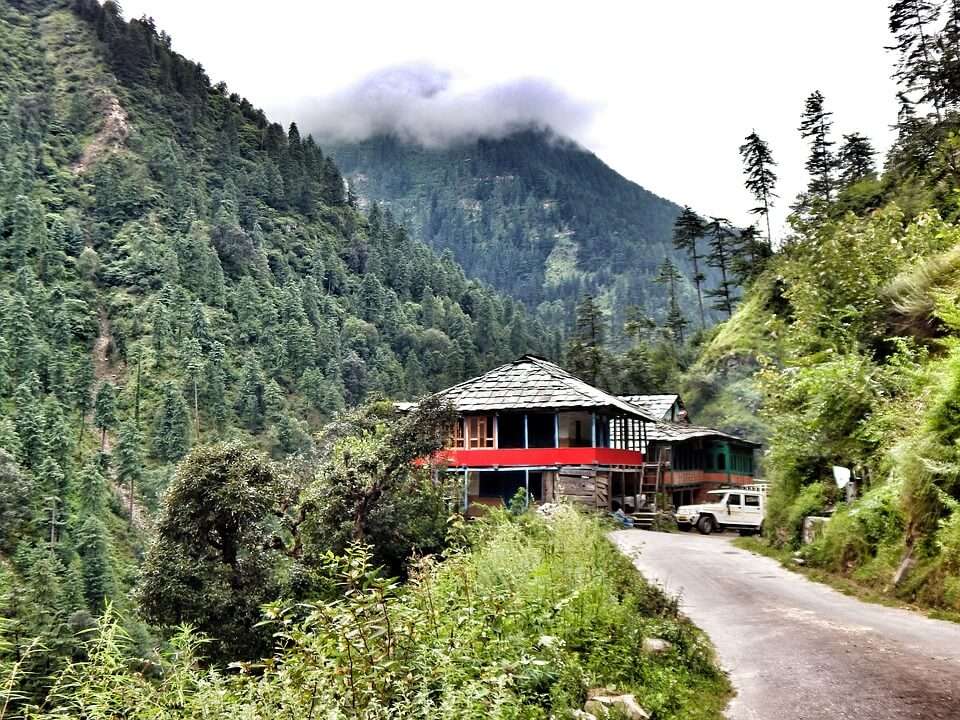 a home along a road in mountains