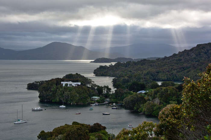 Sunbeams over islands Faith, Hope, and Charity