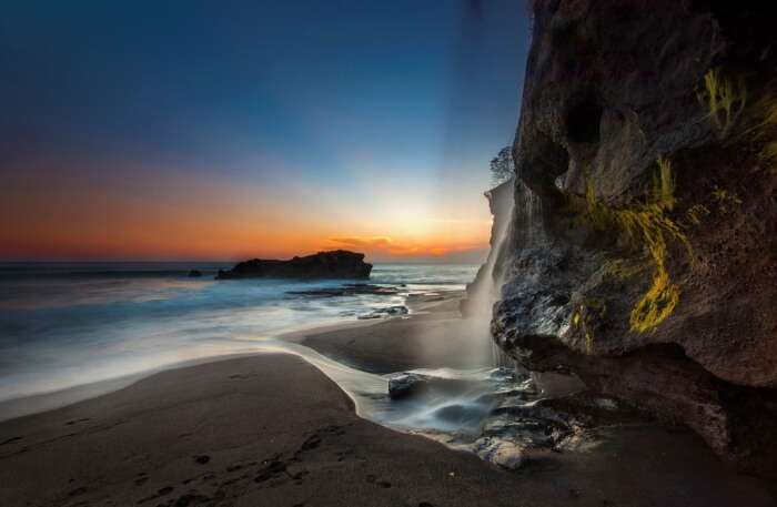 Visit The Melasti Beach Waterfall