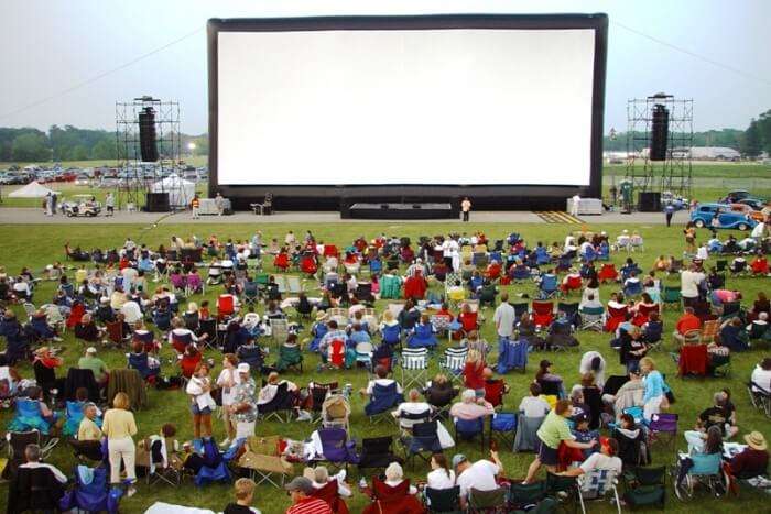 Watch a movie under the shining stars and blue sky