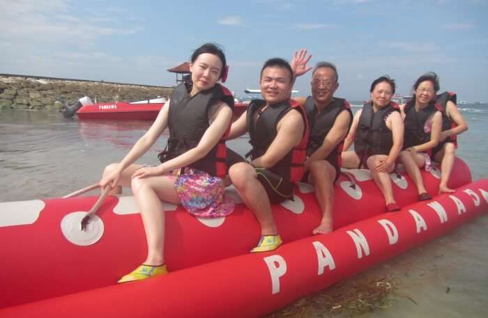 girls on small boat