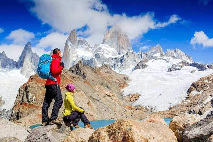 man trekking on fit roy