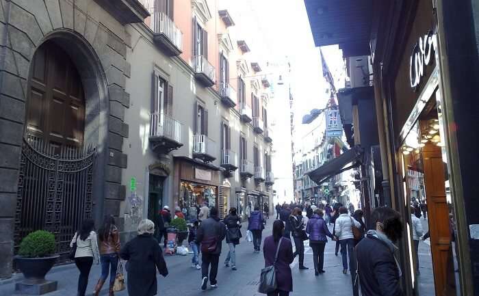 Louis Vuitton Shop in Via Roma Street with business man walking