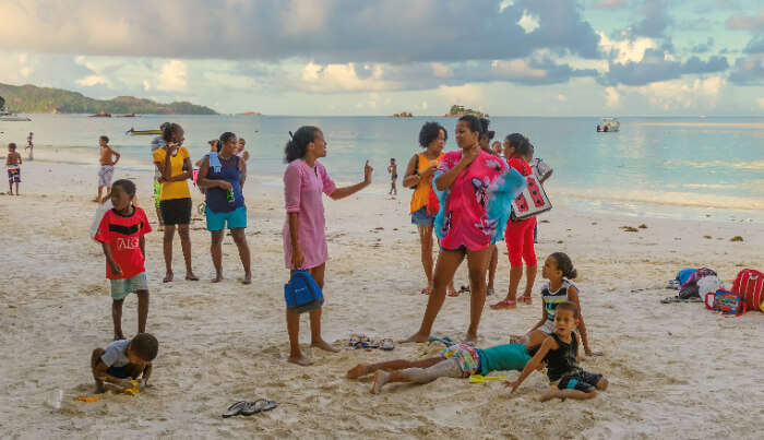 people enjoying on the beach