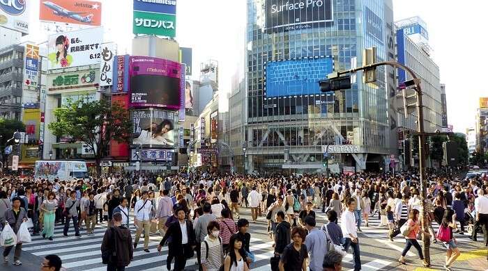 people crossing the road in Japan