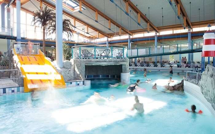 people swimming in water park