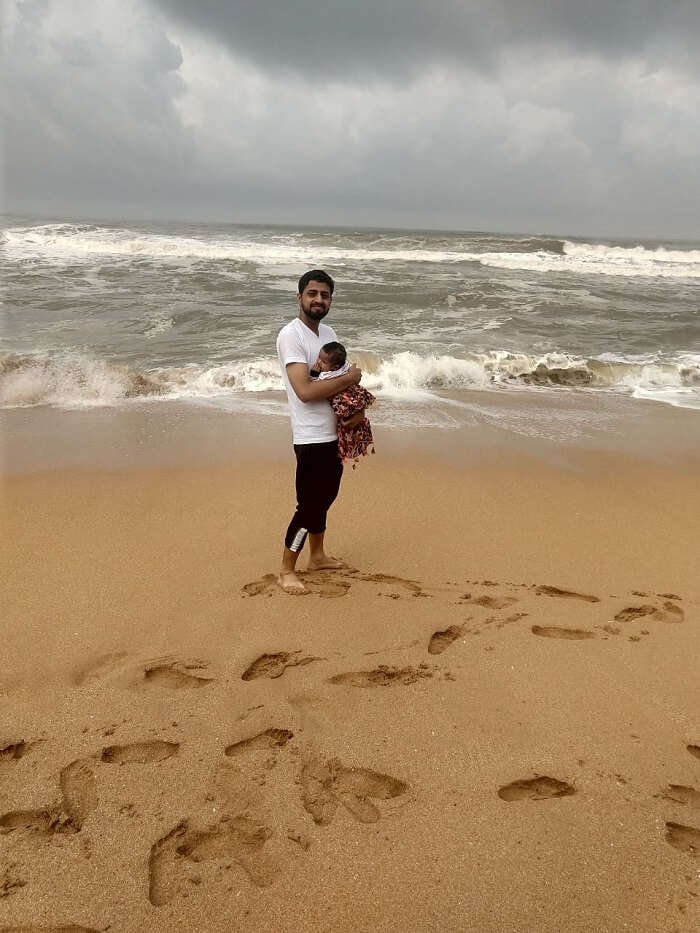 daddy and daughter on the beach