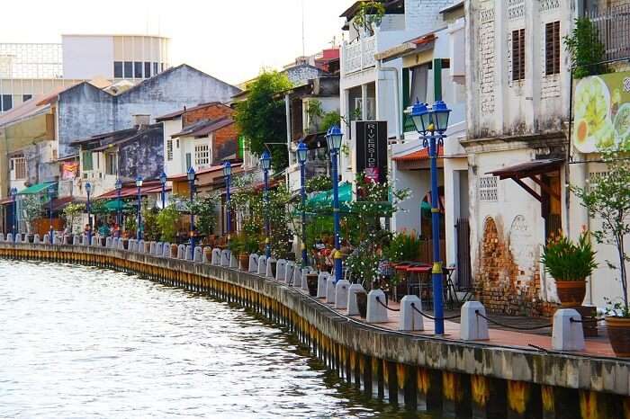 river flowing along side town