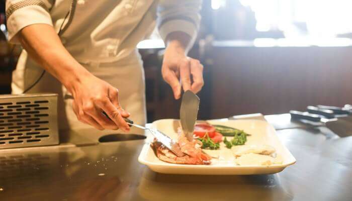 chef serving the dish