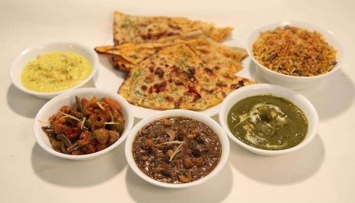 variety of dal served with breads 