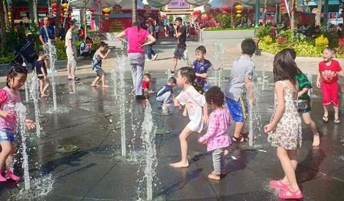Children Playing With Water