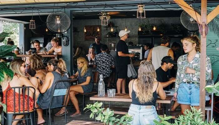 people having food at a cafe