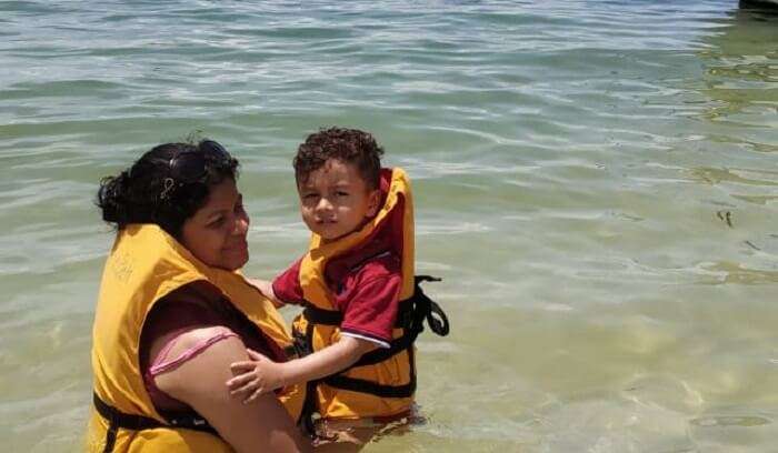 kid is having fun in water