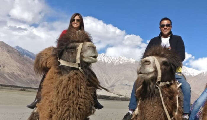 Riding on the back of these camels in the desert of Nubra