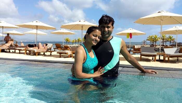 me and my wife at swimming pool