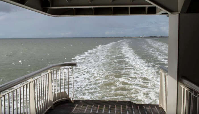 A small ship cruises in Indonesia