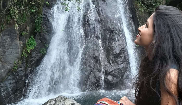 watching the beauty of the waterfall