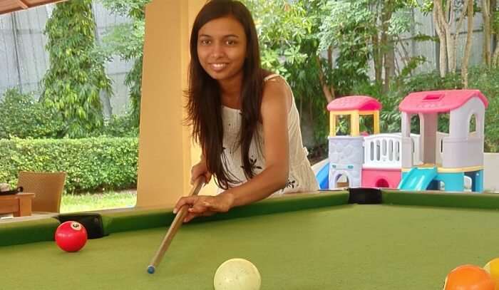 playing pool in resort