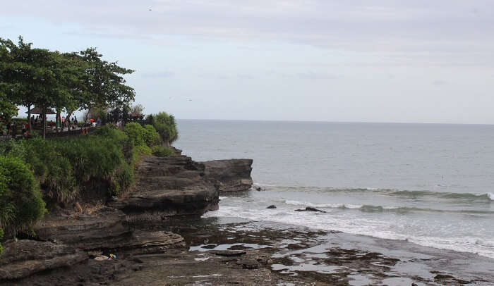 At Tanah lot temple