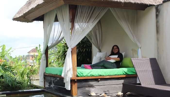 relaxing on the pool side in the resort