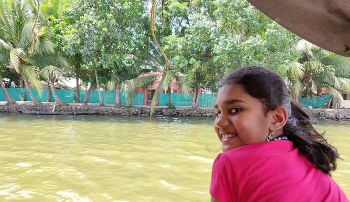 Sailing on the peaceful amber-hued backwaters